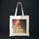 Vintage Christmas, Santa Claus いけな Nice List トートバッグ<br><div class="desc">ヴィンテージイラストレーションメリークリスマスの休日の画像すてきは、サンタクロースが赤い帽子を被り、クリスマスイブに彼のいけなまたは素敵なリストをチェックする。</div>