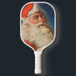 Vintage Christmas, Santa Claus いけな Nice List ピックルボールラケット<br><div class="desc">ヴィンテージイラストレーションメリークリスマスの休日の画像すてきは、サンタクロースが赤い帽子を被り、クリスマスイブに彼のいけなまたは素敵なリストをチェックする。</div>