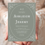 Vintage Foliage Sage Green Wedding 招待状<br><div class="desc">This elegant wedding invitation pairs a beautiful vintage typeface with sans serif font. The white text is framed by a thin oval surrounded by delicate botanical vine motifs in the corners,  on a sage green background. The frame is repeated on the reverse,  enclosing a pair of monogram initials.</div>