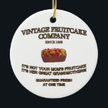 Vintage Fruitcake Company セラミックオーナメント<br><div class="desc">句"Vintage Fruitcake Companyのそれはによって囲まれるおいしいfruitcakeあなたのお母さんのfruitcakeではないです。 それは彼女の曾祖母です。 保証された新しいかつて"</div>