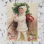 Vintage Girl with Christmas Tree, Ellen Clapsaddle ジグソーパズル<br><div class="desc">Vintage illustration Christmas holiday design featuring a young girl wearing a fur coat carrying a Christmas tree. Light snow is falling. May You Have a Merry Christmas by Ellen Clapsaddle. 1909.</div>