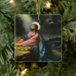 Vintage Jesus Christ Praying, Garden of Gethsemane セラミックオーナメント<br><div class="desc">Vintage illustration religious design Christ in the Garden of Gethsemane by Heinrich Hofmann. Jesus Christ is praying in Gethsemane wearing a long flowing robe and praying while looking up towards Heaven with a star shining down, he is deep in thought and prayer. Gethsemane is a garden at the foot of...</div>
