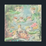 Vintage Mermaids with Crab and Fish Nautical マグネット<br><div class="desc">This design is adapted from an antique storybook page that I restored and colorized. It features lovely red and golden haired mermaids swimming in their underwater habitat with sea life like fish, crabs, and mollusks. They are surrounded by an oceanic garden of seaweed and coral and seem to be having...</div>