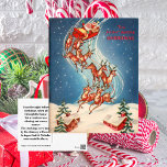 Vintage Santa Claus Sleigh and Reindeer Flying シーズンポストカード<br><div class="desc">Isn't this just the classic old postcard, Santa and the reindeer flying through the night on Christmas Eve. Send this postcard to someone who loves the classic retro look. The beginning of the poem, Twas the Night Before Christmas is inscribed on the back, but can be easily changed to your...</div>