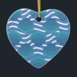 Vintage Seashell And Waves Pattern セラミックオーナメント<br><div class="desc">A blue seashell and waves pattern drawing. Mosaic style design in shades of blue.</div>