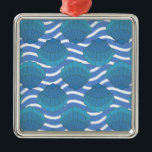 Vintage Seashell And Waves Pattern メタルオーナメント<br><div class="desc">A blue seashell and waves pattern drawing. Mosaic style design in shades of blue.</div>