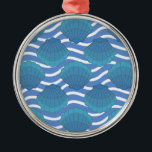 Vintage Seashell And Waves Pattern メタルオーナメント<br><div class="desc">A blue seashell and waves pattern drawing. Mosaic style design in shades of blue.</div>