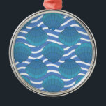 Vintage Seashell And Waves Pattern メタルオーナメント<br><div class="desc">A blue seashell and waves pattern drawing. Mosaic style design in shades of blue.</div>