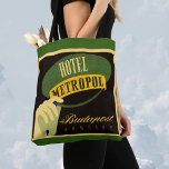 Vintage Travel Budapest Hungary Bellhop Hat トートバッグ<br><div class="desc">Vintage illustration European travel poster or luggage label from the Hotel Metropol,  Budapest,  Hungary. A hand with a formal white glove holding a green and yellow bellhop hat or cap.</div>