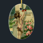 Vintage Victorian Valentine's Day, Angel Hearts セラミックオーナメント<br><div class="desc">Vintage illustration Victorian Valentine's Day holiday image with cupid trying to reach through a window with pink roses in front of it. This darling cherub is holding an arrow with two hearts. Loving Greeting.</div>