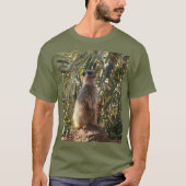 Watchful Sentinel: Meerkat On Lush Green Backdrop Tシャツ (正面)