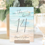 Watercolor On The Beach Wedding テーブルナンバー<br><div class="desc">Simple Seaside Watercolor Wedding Table Number Card. Bring a coastal touch to your wedding reception with this beach-themed table number card featuring a calming watercolor design in soft shades of blue and tan. The abstract shoreline artwork appears on both sides, making it easy to see from any angle. At the...</div>