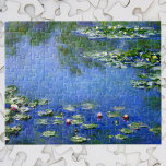 Waterlilies by Claude Monet, Vintage Fine Art ジグソーパズル<br><div class="desc">Waterlilies by Claude Monet is a vintage impressionism fine art nature painting featuring waterlilies in a pond in Monet's garden at his home in Giverny, France. A sunny spring or summer day with the bright blue sky reflecting in the pond. Claude Monet enjoyed painting "en plein air" or "in the...</div>