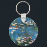 Waterlilies by Claude Monet, Vintage Impressionism キーホルダー<br><div class="desc">Waterlilies (1914) by Claude Monet is a vintage impressionist fine art nature painting. One of many variations of water lily floral paintings that Monet painted by the pond in his flower garden in Giverny, France. About the artist: Claude Monet (1840-1926) was a founder of the French impressionist painting movement with...</div>