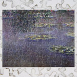 Waterlilies by Claude Monet, Vintage Impressionism ジグソーパズル<br><div class="desc">Waterlilies by Claude Monet is a vintage impressionism fine art nature painting featuring waterlilies in a pond in Monet's garden at his home in Giverny, France. A tree hangs over the pond while the sky is reflecting in the water. A series of over 250 waterlily flower paintings that Monet painted...</div>