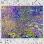 Waterlilies by Claude Monet, Vintage Impressionism ジグソーパズル<br><div class="desc">Waterlilies by Claude Monet is a vintage impressionism fine art nature painting featuring waterlilies in a pond in Monet's garden at his home in Giverny, France. The sky and trees are reflecting in the water. A series of over 250 waterlily flower paintings that Monet painted during the last 30 years...</div>