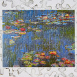 Waterlilies by Claude Monet, Vintage Nature Art ジグソーパズル<br><div class="desc">Waterlilies by Claude Monet is a vintage impressionism fine art nature painting featuring waterlily flowers in a pond in Monet's garden at his home in Giverny, France. Beautiful flowers are floating in the water and green weeping willow trees are casting a reflection. Claude Monet enjoyed painting "en plein air" or...</div>