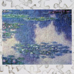 Waterlilies in Pond by Claude Monet, Vintage Art ジグソーパズル<br><div class="desc">Waterlilies by Claude Monet is a vintage impressionism fine art nature painting featuring waterlilies in a pond in Monet's garden at his home in Giverny, France. Tree reflections are in the pond. A series of over 250 waterlily flower paintings that Monet painted during the last 30 years of his life....</div>