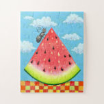 Watermelon Slice w/ Ant Funny Whimsical Summer ジグソーパズル<br><div class="desc">This whimsical summer art jigsaw puzzle features a delicious slice of watermelon with a cute ant insect climbing the side of it on a checkered table cloth with blue sky behind. Great for kids and those that love whimsical art. Designed by world artist ©Tim Coffey.</div>