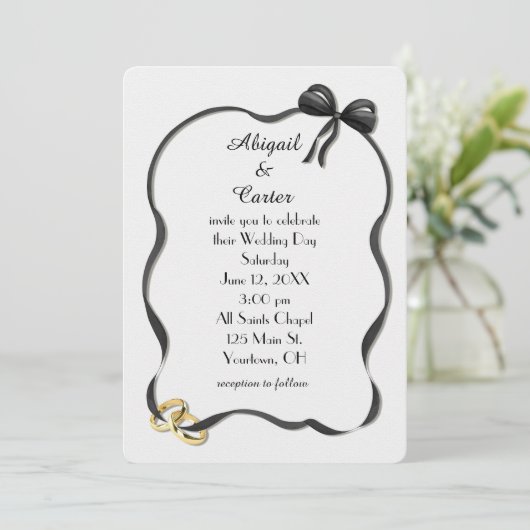 Wedding Rings and Bow Frame On White 招待状 (スタンド正面)