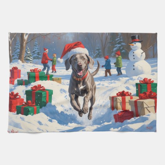 Weimaraner Running in Snow with Christmas Hat キッチンタオル (横)