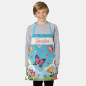Whimsical Blue Sky Butterflies and Floral Garden エプロン (着用した状態)