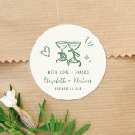 Whimsical Hand Drawn Green Cream Wedding Thank You ラウンドシール<br><div class="desc">Trendy light cream wedding stickers for your party favors and thank you cards featuring whimsical hand-drawn green illustrations of a heart,  stars and wine glasses,  and "with love   thanks" and the names of the bride and groom in fun and playful green script and lettering.</div>
