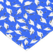 White Graduation Caps on Bright Blue テーブルクロス (アングル)