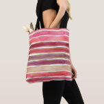 Wide Watercolor Stripes Shades of Plum Wine Pink トートバッグ<br><div class="desc">Wide watercolor stripes in vibrant shades of plum,  wine,  and pink with faux gold stripes between them decorate this reusable tote bag. Great for hauling your summer time gear or for grocery shopping all year.  AI generated by IveyCottage.</div>
