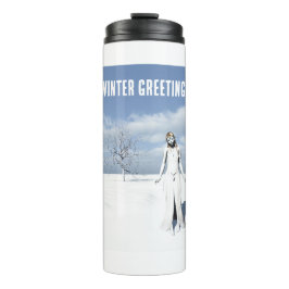 Winter Greetings. Female elf walking in the snow  タンブラー