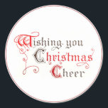 Wishing You Christmas応援ヴィンテージ照明 ラウンドシール<br><div class="desc">精巧なヴィンテージ読文字"Wishing You Christmas応援。 各単語の最初の文字は光書の原稿に似た古いファッションドレタリングで書かれている。赤と黒の文字と緑縁ど。グリーティングカードに一致。</div>