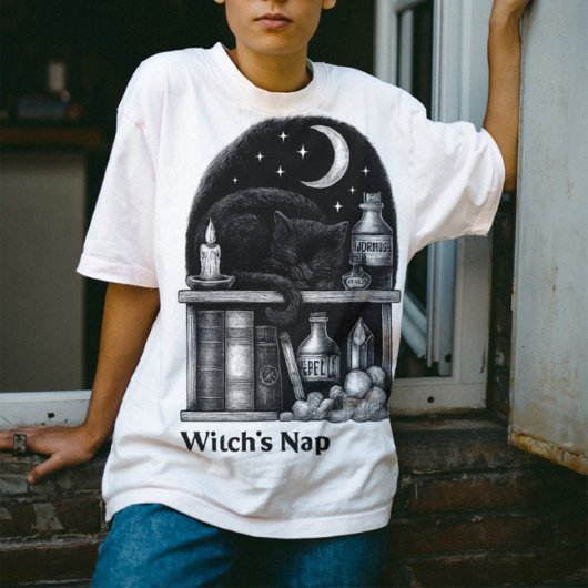 Witch’s Nap – Black Cat Sleeping in Potion Shelf Tシャツ