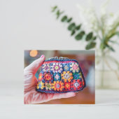 Woman Holding a Crocheted Coin Purse Made From Gra ポストカード (スタンド正面)