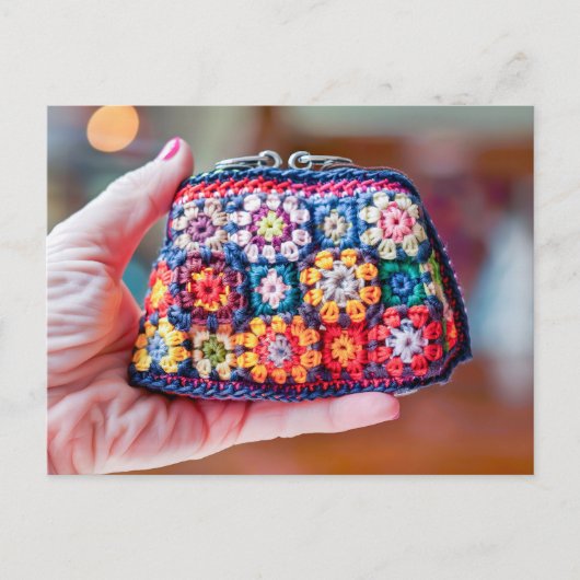 Woman Holding a Crocheted Coin Purse Made From Gra ポストカード (正面)