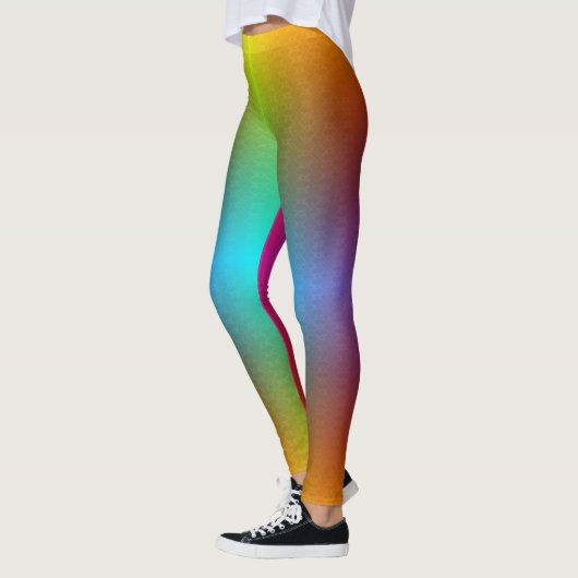 Woman in rainbow gradient leggings with a subtle  レギンス (左)