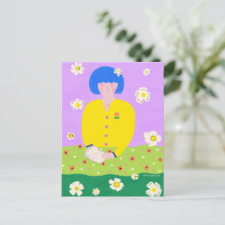 Woman reading in the garden ポストカード