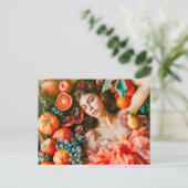 Woman reclining among fruits and petals ポストカード (スタンド正面)