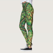 Woman wearing vibrant leggings with an intricate  レギンス (左)
