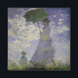 Woman with Parasol by Claude Monet, Vintage Art マグネット<br><div class="desc">The Stroll, Camille Monet and Her Son Jean (Woman with a Parasol) (1875) by Claude Monet is a vintage impressionist fine art family portrait painting. A mother taking a walk with her young child in a field or spring meadow. She is holding a sun umbrella and wearing a beautiful dress...</div>