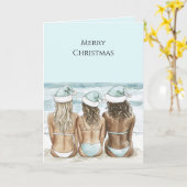 Women in Santa Hats on Beach Christmas カード (黄色い花)