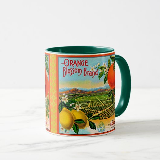 WQのマグのコップ: オレンジ花の木枠のラベル マグカップ (正面右)