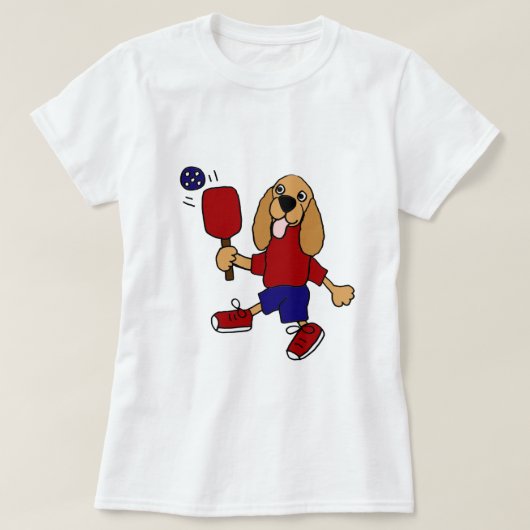 XX Pickleballの漫画を遊んでいるコッカースパニエル Tシャツ (デザイン正面)