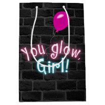 You Glow Girl Sign on Brick Wall