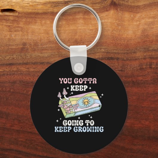 You Gotta Keep Going To Keep Growing Motivational  キーホルダー (正面)
