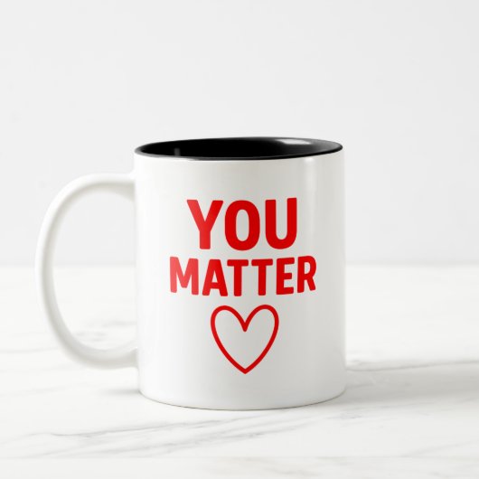 You Matter"赤いハート陽性 ツートーンマグカップ (左)