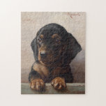 Young Dachshund | Carl Reichert ジグソーパズル<br><div class="desc">Young Dachshund | Carl Reichert’s Young Dachshund is a heartwarming portrait of a dachshund puppy, showcasing the artist’s remarkable attention to detail and ability to capture the animal’s endearing expression. The puppy’s soulful eyes and soft fur are rendered with exquisite precision, set against a neutral background that emphasizes the subject’s...</div>