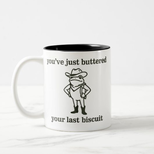 You've just Buttered Your Last Biscuit Cowboy Frog ツートーンマグカップ (左)