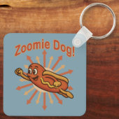 Zoomie犬飛んでいるホットドッグ漫画 – おもしろいレトロ キーホルダー (裏面)
