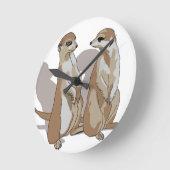 zwei Erdmännchen mit Schatten ラウンド壁時計 (傾斜)